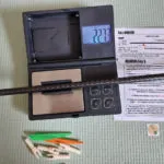 Weighing-the-arrow-shaft-using-the-rubber-holder.